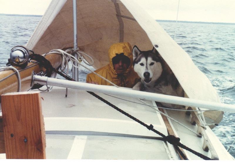 EveningStarOday23_014.jpg - Just launched Evening Star (O'Day 23) and running it up the ICW to Atlantic City. Ralph in rain gear and Ken's dog TOK with me.